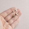 Crescent studs